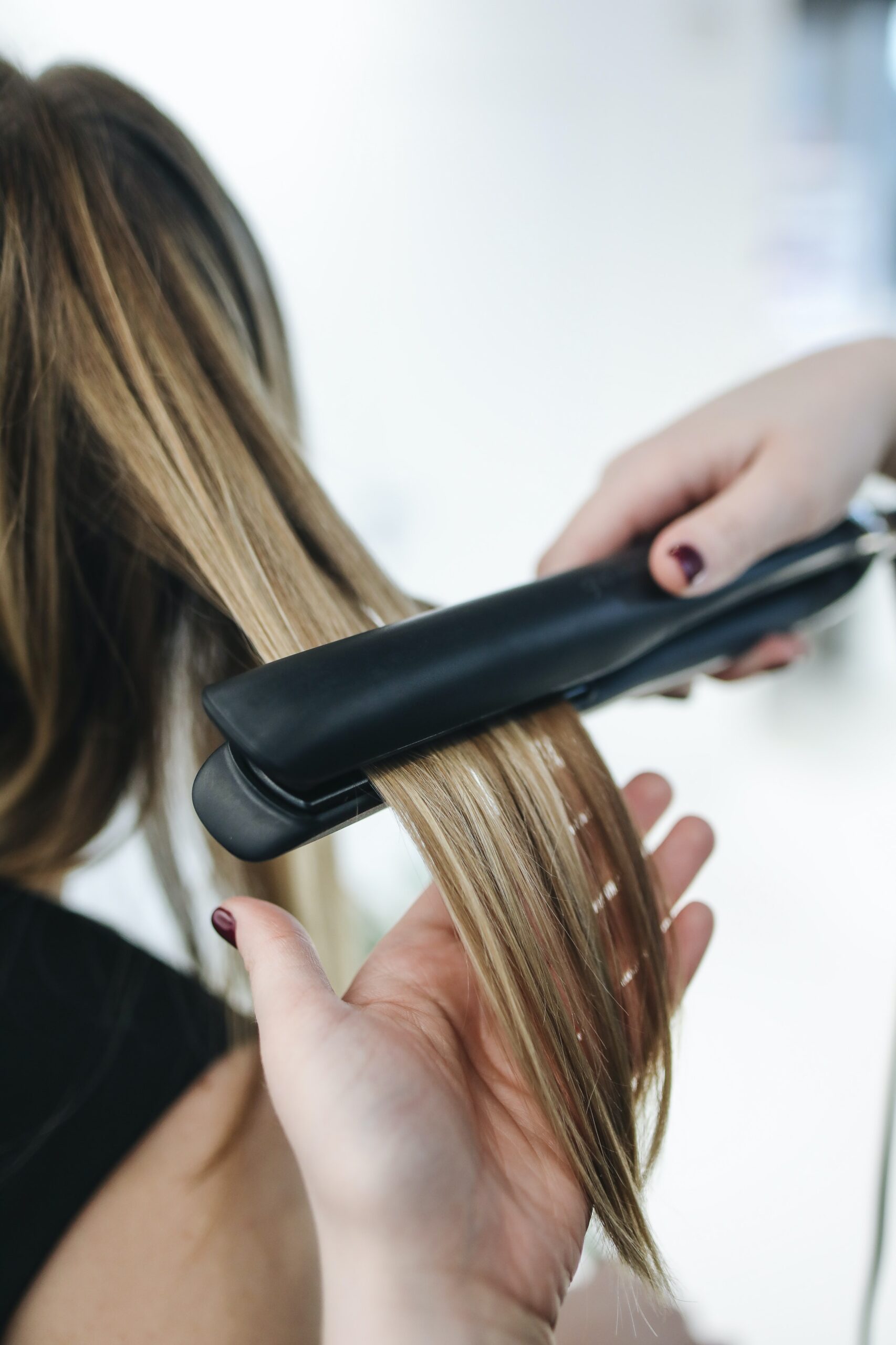 Using hair straightener on long hair causing heat damaged hair